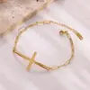 Joyería Transfronteriza Europea y Americana Pulsera de Acero Inoxidable Chapada en Oro de 18K Pulsera Sencilla con Cruz Recortada para Mujer Fabricante Mayorista