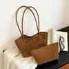 Bolsa de ombro simples transfronteiriça vazada tecida bolsa mãe-filho bolsa de ombro única casual personalizada comércio exterior tendência estilosa bolsa de axila