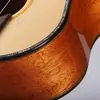 Los fabricantes suministran nuevos ukeleles de 24 pulgadas con núcleo de flor de durazno de abeto para aprender a tocar la pequeña guitarra de madera