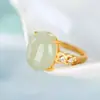 Anillo abierto de plata 925 con incrustaciones de oro, jade blanco, superficie de huevo, garra con incrustaciones de corazón, circonita hueca adornada, temperamento, joyería para mujer