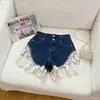 Shorts Jeans de Verão 2026 Estilo Americano com Barra de Renda, Cintura Alta, Tamanho Petite, Emagrecedor, Modelo Amplo Linha A