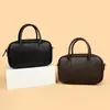 2026 Nueva Moda Popular Textura Casual Color Sólido Bolso Boston Portátil Bolso Cruzado de Hombro Casual Retro para Mujer