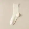 Calcetines Zhuji para mujer, calcetines de media pantorrilla, desodorantes, absorbentes de sudor, para mujer, a la moda, combinan con todo, primavera y otoño, color liso, calcetines deportivos de felpa, otoño e invierno