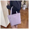 Mini Bolso 2026 Color Sólido Bolso de Mujer Repelente al Agua Bolsa Pequeña de Tela Bolso de Maquillaje a la Moda Bolso de Mano Sencillo para el Viaje