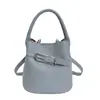 Bolso casual y único de diseño de nicho para mujer, moderno bolso tipo cubo nuevo de primavera 2026, bolso de hombro y bandolera de moda
