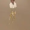 Pendientes Largos Dorados Huecos con Borlas 2025 Nuevos Pendientes de Moda de Gama Alta con un Toque de Lujo para Mujer
