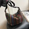 Nova Bolsa Transversal de Ombro Único para Axila Outono e Inverno Bolsa de Mão Listrada Europeia e Americana para Mulheres 2025 Nova Moda Tendência Versátil