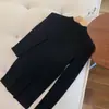 Hong Kong e American Apparel/Primavera 2026 Lã e Seda Gola Alta Quente e Resistente ao Frio Versátil Malha Básica Camada Base