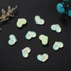 Nuevas joyas de cristal para uñas con forma de corazón de melocotón ancho y moca plana, decoraciones para uñas usables de colores mágicos.