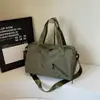 Bolsa de Viaje de Gran Capacidad 2026 Nuevo Estilo Bolso de Hombro Único para Estudiante Universitario Bolso Tote de Nicho Bolsa Grande para Viajes de Negocios al Trabajo Venta al por Mayor
