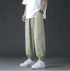 Pantalones deportivos holgados de verano finos para hombre, versátiles, de seda de hielo negra, estilo jogger, de secado rápido, modernos, casuales, largos para hombre