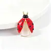 Broche creativo de mariquita de siete puntos, accesorio de insecto de dibujos animados de esmalte de aleación, pin de decoración para mujer moderno y versátil, transfronterizo