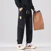 Calça Jeans Masculina Forrada com Fleece, Grossa e à Prova de Vento, Estilo Outono e Inverno 2025, Jogger Solta, Calça Cargo Patchwork Estilo Americano para Adolescentes