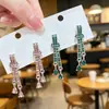 Nuevos Pendientes Largos de Lujo Ligero con Sentido de Alta Gama Temperamento Elegante Diseño de Nicho Orejeras de Moda Nudo Colgante de Pendiente de Gota de Agua