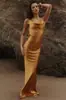 Vestido Largo Elegante de Tirantes Fuera del Hombro Ajustado de Color Sólido de Satén de Alta Gama Ajustado al Cuerpo Nuevo Estilo Europeo y Americano 2026