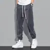 Pantalones de Chándal para Hombre Transfronterizos Sueltos para Hombre Otoño Nuevo Estilo Pantalones Casuales Marca Tendencia Juvenil Versátiles Deportivos Pantalones con Cordón para Hombre