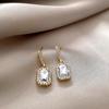Pendientes de aguja de plata Corea del Sur red roja diamante circón pendientes para mujer lujo ligero pendientes de alta gama nicho temperamento socialité al por mayor