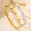 Nova moda europeia e americana estrela trevo de quatro folhas dez diamantes pulseira amantes tudo combina ouro verdadeiro que não desbota pulseira de aço titânio joias