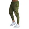 Pantalones deportivos de color liso para hombre, transfronterizos europeos y americanos, corte ajustado, pierna cónica, pantalones largos atléticos, cordón, pantalones casuales para correr y fitness