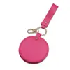 Espejo de cuero grueso en stock con gancho para colgar, se puede usar como accesorio de bolso, espejo de maquillaje redondo de cuero de color sólido, personalizable