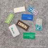 Accesorios de ropa directos de fábrica clásicos rectangulares de plástico gota de pegamento accesorios de gota marca color brillante multiestilo
