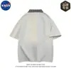 Camisa Polo de Verano Estilo Americano de Dos Piezas Falsas con Retazos Manga Corta Diseño para Hombre Elegante con Cuello Camisero Tendencia Marca Nasa