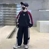 Conjunto de ropa infantil para niños, nuevo estilo primavera y otoño 2026, conjunto deportivo de dos piezas elegante y genial estilo coreano para niños mayores