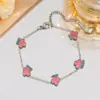 Pulsera de Trébol de Cuatro Hojas Transfronteriza, Lujo Ligero y de Alta Gama, Accesorios de Joyería Populares de Nicho Femenino, Joyería de Mano Simple Europea y Americana