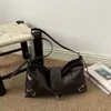 Nuevo bolso de axila vintage de otoño e invierno para mujer, bolso de hombro de cuero suave de alta gama, bolso cruzado versátil para el día a día, bolso baguette de motociclista