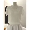 Ropa de Mujer de Alta Gama Nanyou Verano 2026 Nuevo Top Chic de Punto Trenzado con Perlas y Manga Corta para el Trabajo