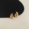 Pendientes retro geométricos de metal exagerados con diseño de nicho irregular, elegantes pendientes europeos y americanos de alta calidad para mujer.