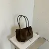 Bolso de gamuza para mujer 2026 nuevo otoño vintage Maillard bolso de hombro para el día a día con un toque de alta gama bolso cubo para el día a día