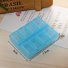 Pastillero pequeño de plástico transparente de 8 rejillas, de color sólido, con tapa, venta directa de fábrica.