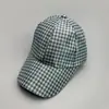 Nueva moda gorra de béisbol clásica de cuadros pequeños para hombre y mujer versión coreana de Joker personalidad casual visera gorra de pico de pato al por mayor