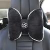 Reposacabezas universal para coche con lazo de camelia para cuatro estaciones, cómodo cojín para la cintura y el cuello, suministros para coche.