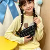 Riñonera de lunares estilo coreano para niños y niñas, un diseño dulce y fresco, perfecta para salidas, una cartera pequeña, una nueva bolsa cruzada infantil transfronteriza
