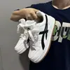 Zapatillas deportivas casuales únicas y versátiles para estudiantes, nuevo modelo de otoño 2026, zapatos blancos con plataforma, suelas gruesas y diseño que aumenta la altura