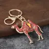 Llavero creativo de camello del desierto lindo y colorido con incrustaciones de diamantes y goteo de aceite, colgante de animal para coche, llavero, accesorio metálico