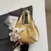 Bolsa de Mão Fashion Estilo Coreano para Mulheres 2026 Nova Bolsa Saco Retrô Simples Alta Estética Personalidade Bolsa de Ombro Transversal