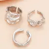 Anillo de estilo frío ins nuevo transfronterizo con textura irregular, juego de 3 piezas, personalidad, nicho, joyería elegante de lujo ligero