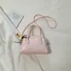 Bolso de axila de lunares dulce y femenino, nuevo y moderno de moda para el verano 2026, bolso de mano personalizado de alto valor, bolso de bolos