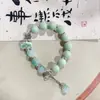 Fornecimento de fábrica pulseira de cerâmica antiga dobrada dupla pulseira de uso literário retrô novo chinês vento frio doce legal uso duplo
