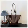 Bolso tote de cuero encerado de gran capacidad transfronterizo para mujer, nuevo diseño moderno y elegante 2026, que irradia una sensación de alta gama, adecuado para el trabajo y los desplazamientos, bolso de hombro
