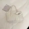 Bolso de diseño versátil 2026 nuevo estilo elegante de alta gama bandolera simple para ir al trabajo gran capacidad bolso de hombro tipo tote moderno