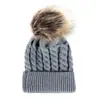Comercio exterior europeo y americano en otoño e invierno gorro tejido de punto de bola retorcida cálido para mujer padre-hijo imitación bola de pelo de mapache gorro de lana