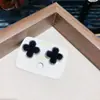 Pendientes de Trébol de Cuatro Hojas Negros 2025 Nuevo Diseño de Nicho Pendientes de Estilo Minimalista de Lujo Ligero Pendientes de Alta Gama
