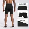 Mallas de Running de Alta Elasticidad de Secado Rápido Dongguan Negro Capa Base Deportiva de Yoga Pantalones Cortos de Compresión para Hombre Pantalones Cortos de Fitness de Cinco Puntos