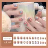Uñas postizas ponibles con un toque de alta gama, populares en línea, manicura de lazo, lindo diseño de corazón girly, uñas estilo dulce y puro deseo