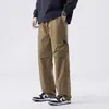 Calças casuais de primavera e verão para homens, calças jogger de corte solto, calças de moletom casuais estilo Hong Kong, novas calças casuais masculinas