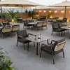 Sillas de mimbre para exteriores estilo nórdico, adecuadas para lugares pintorescos y casas de huéspedes, con un diseño de sofá de mimbre relajado, resistentes al agua y al sol, ideales para patios exteriores, jardines y muebles de exterior